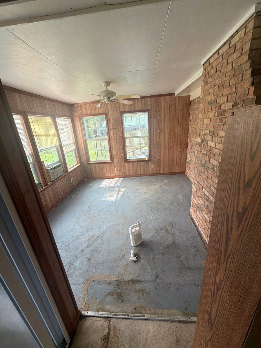 Room after carpet and junk removal in Semmes, AL