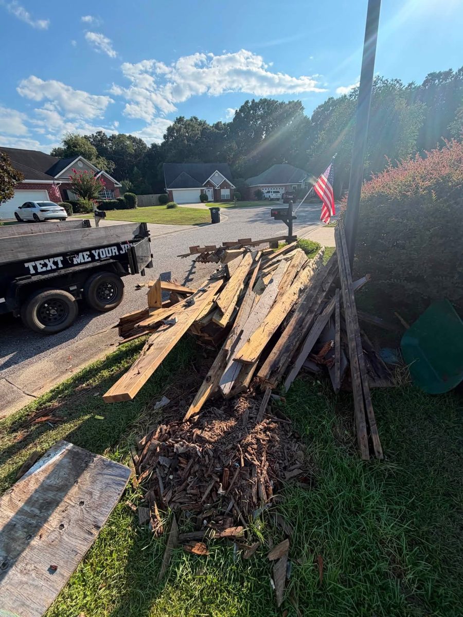 Old deck lumber before removal in Fairhope, AL